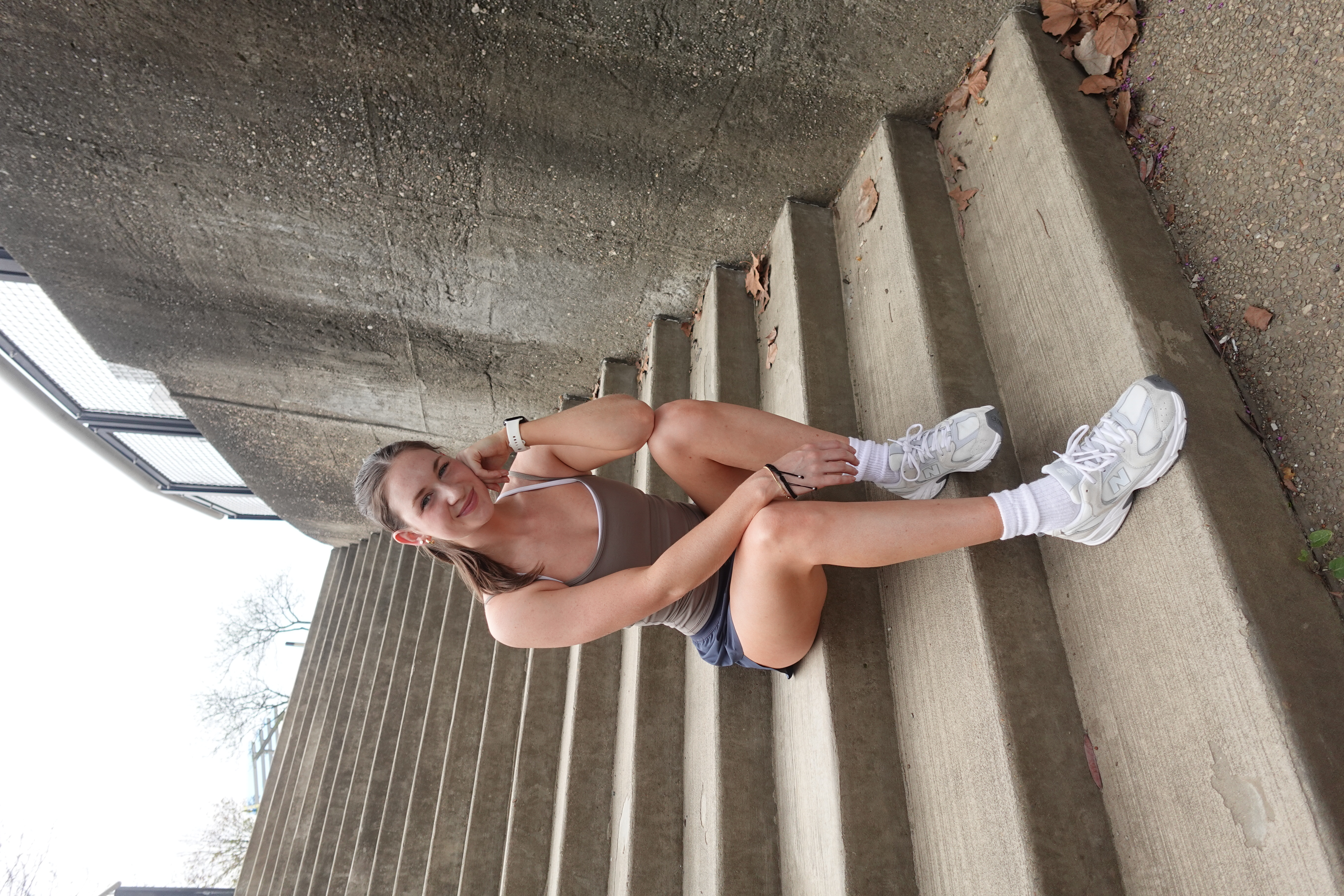 Hannah sitting by the river